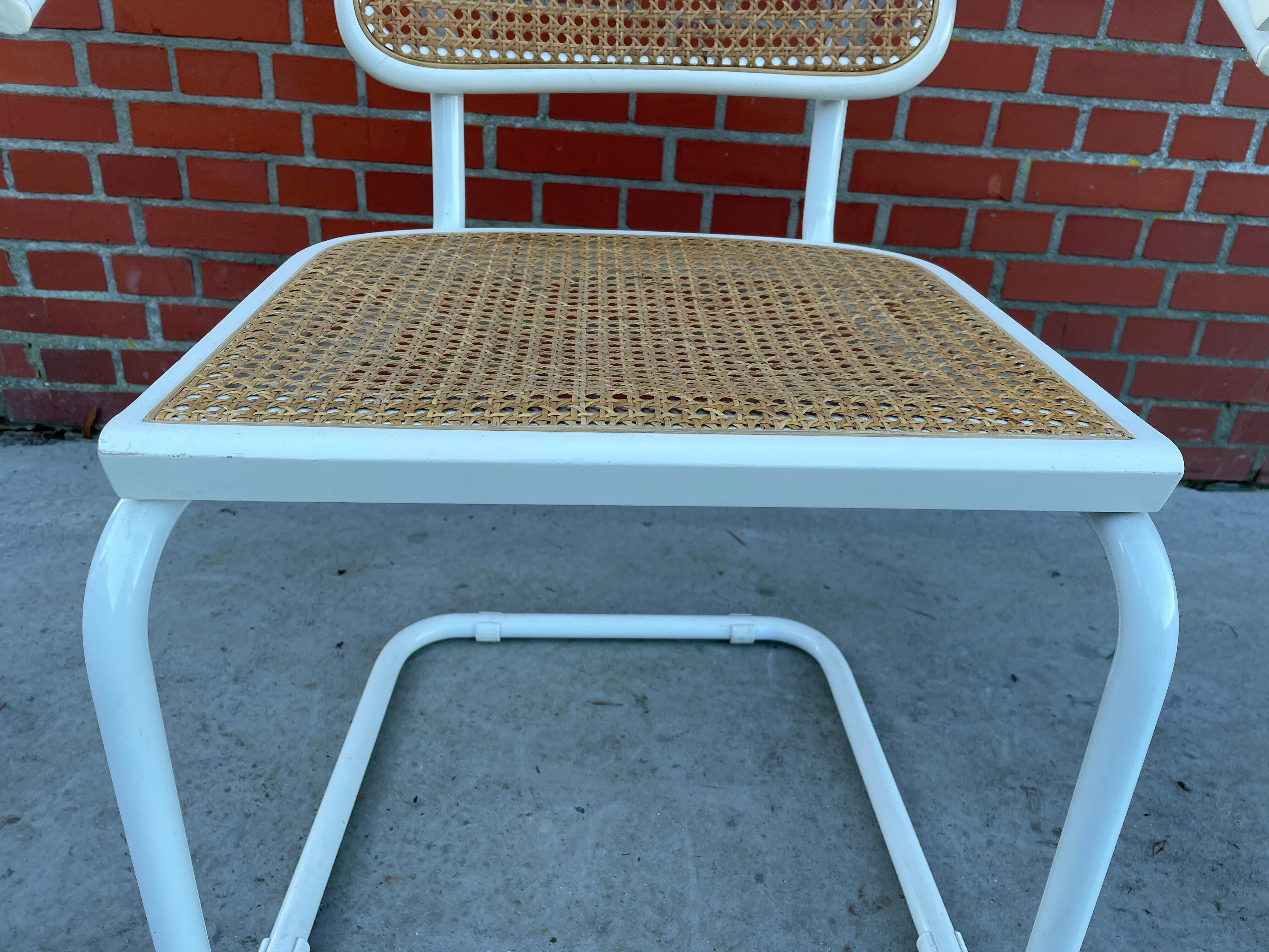 Cesca Chair model with armrest in white