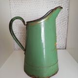 Green broc in enamelled sheet metal with floral patterns