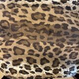 Pair of vintage wood and leopard chairs