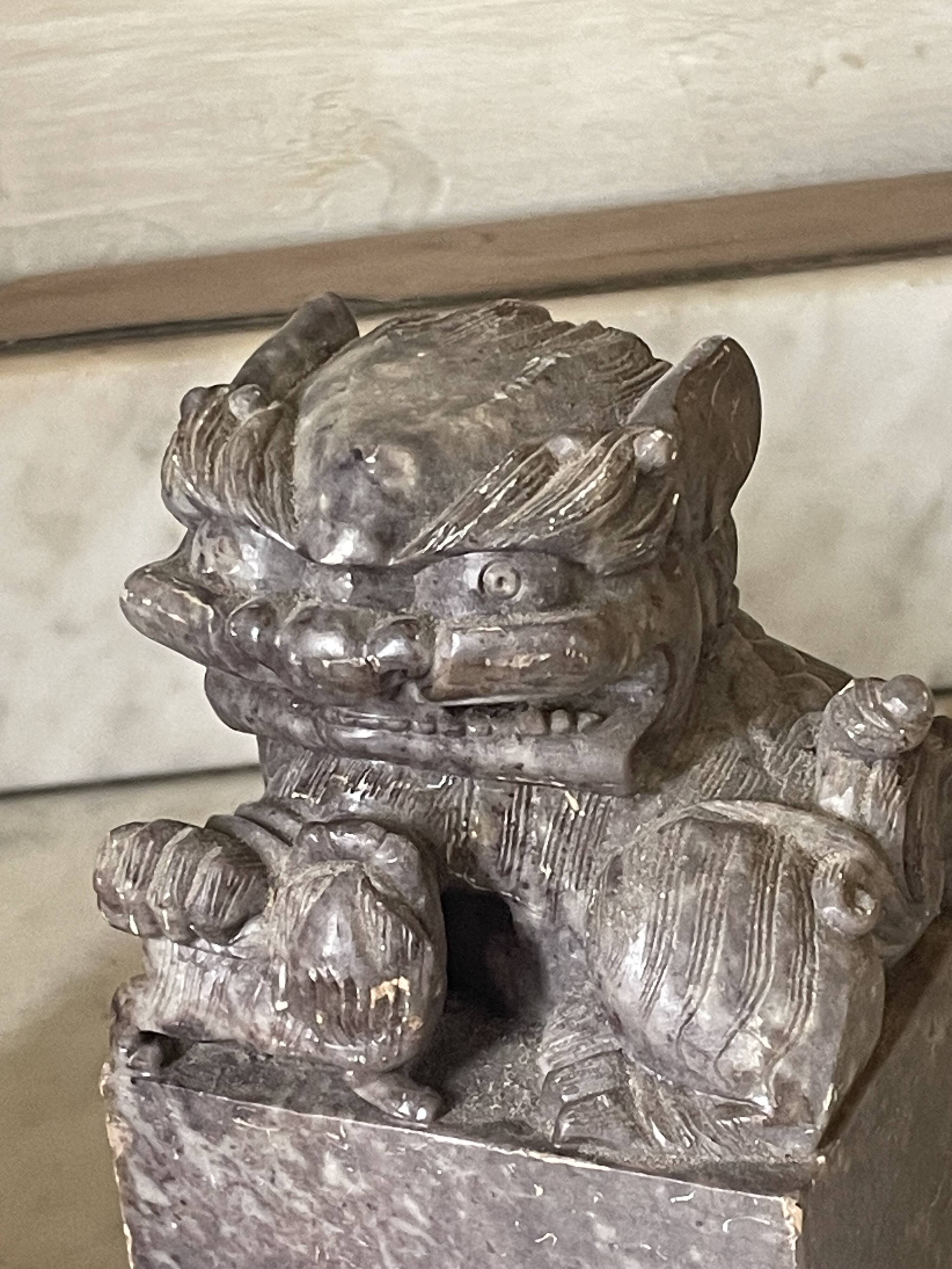 Pair of Foo Dog bookends in sculpted steatite.