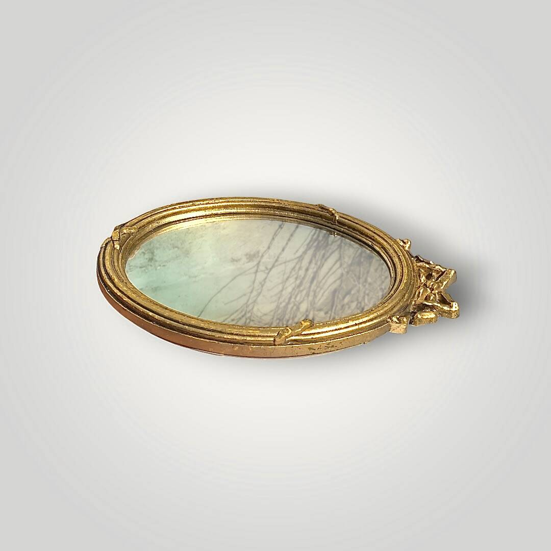 Antique oval wall mirror in gilded resin – Louis XVI knot –