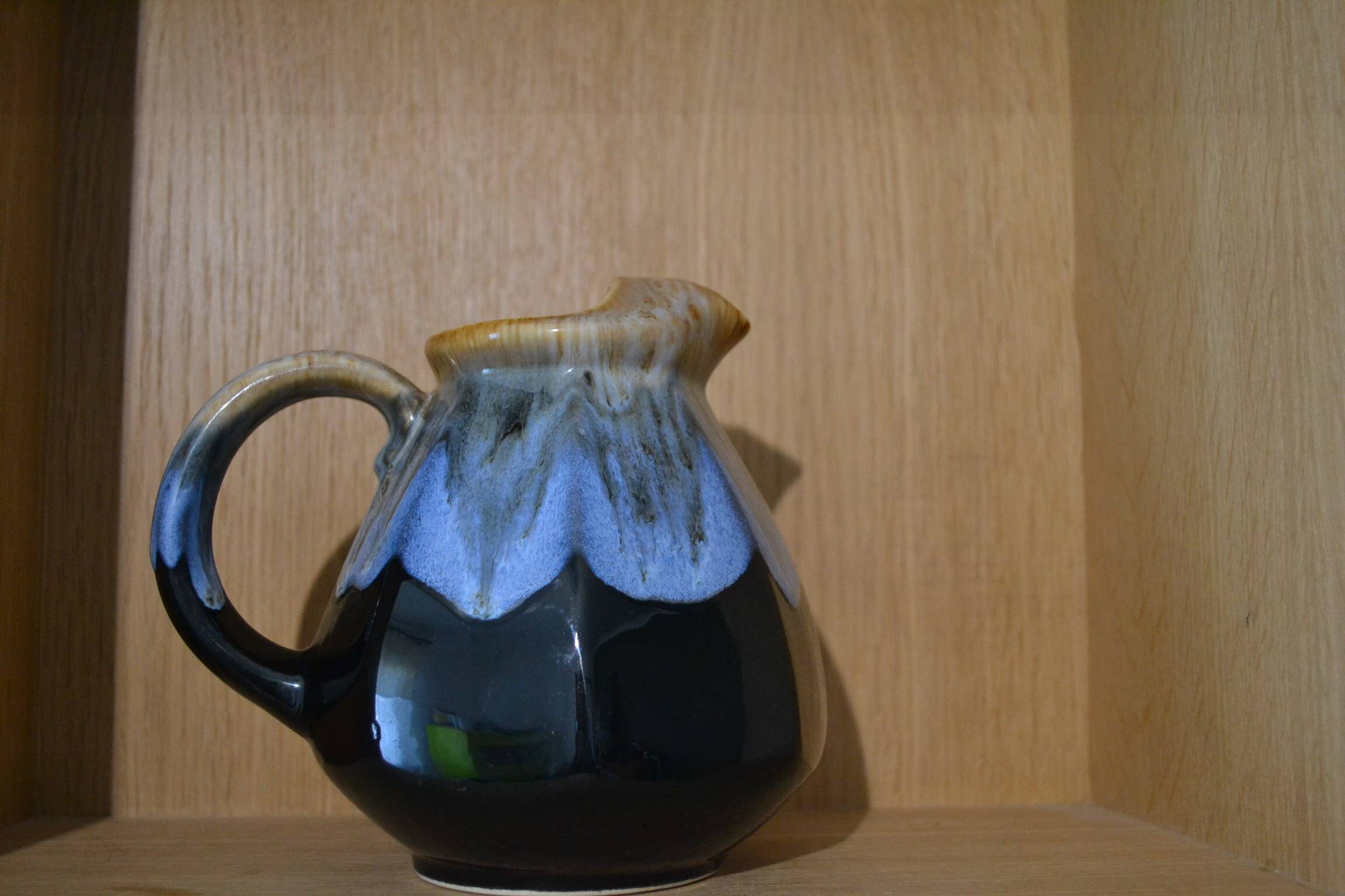Blue flamed stoneware jug