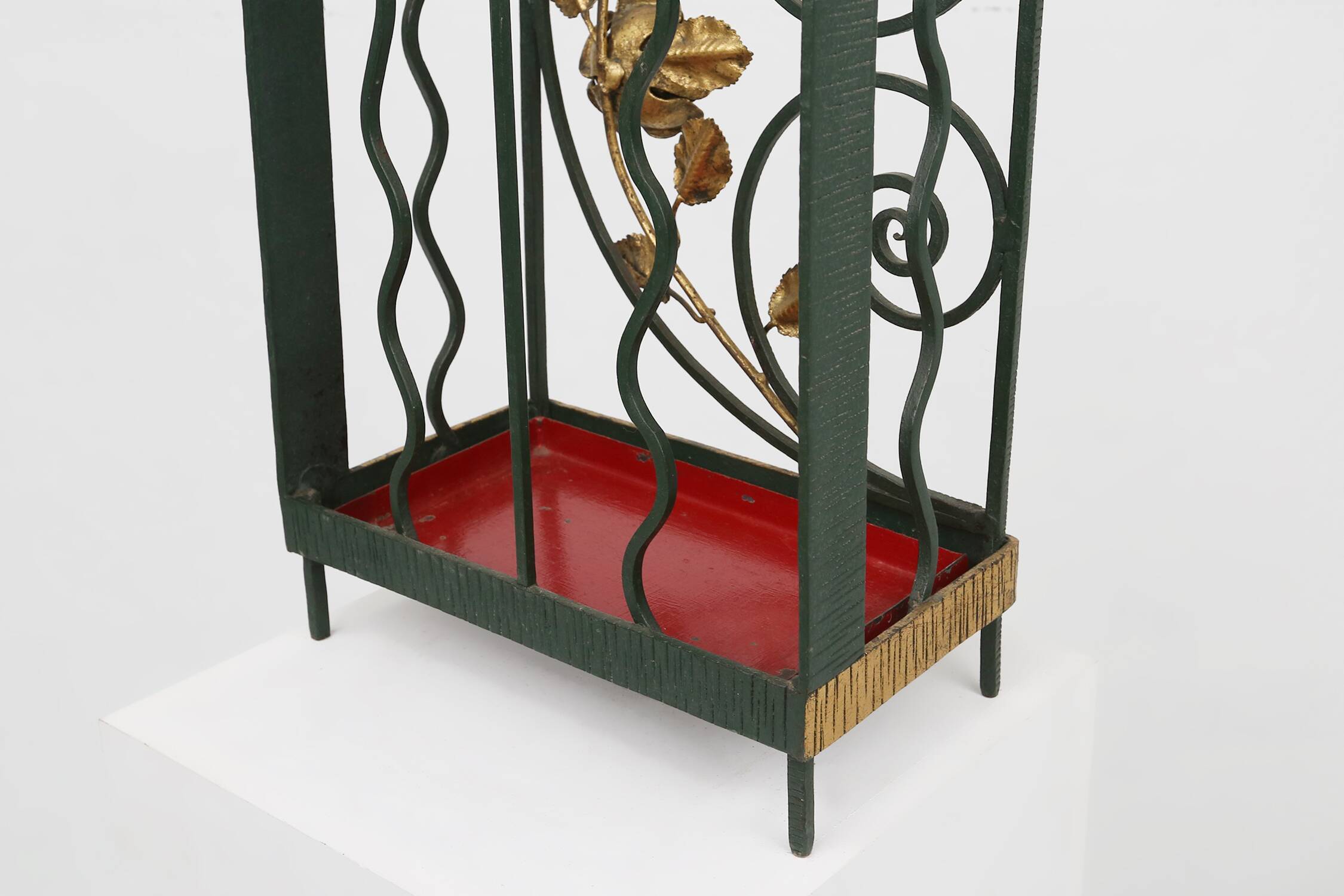 Art deco wrought iron umbrella stand with floral decoration, France ca. 1930