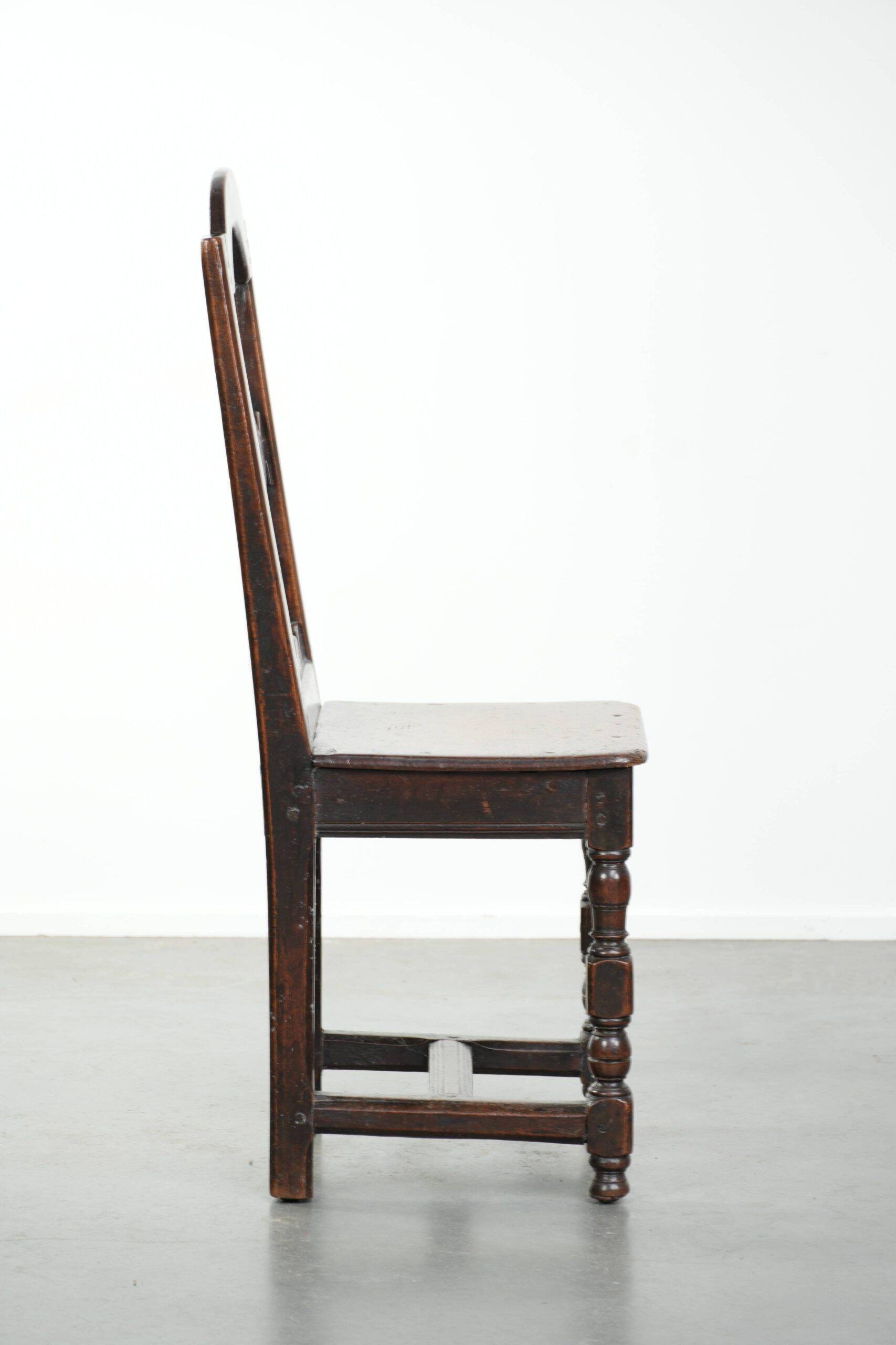 French antique Lorraine chair made of oak from the 18th century