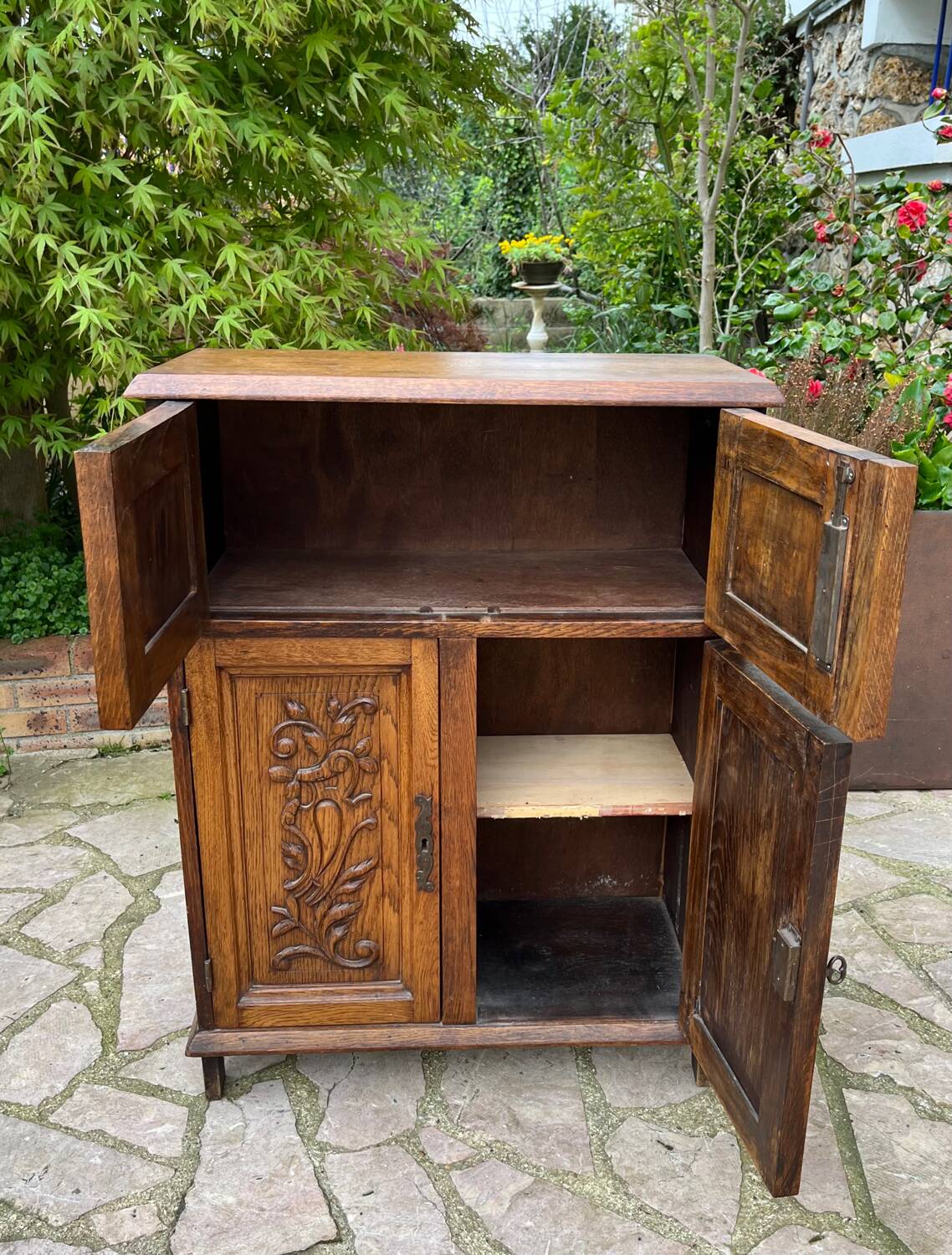 Low carved wooden sideboard