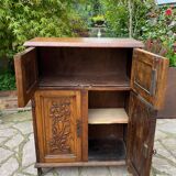 Low carved wooden sideboard