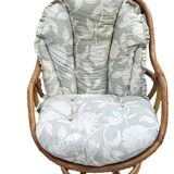 Rotating and rocking rattan armchair