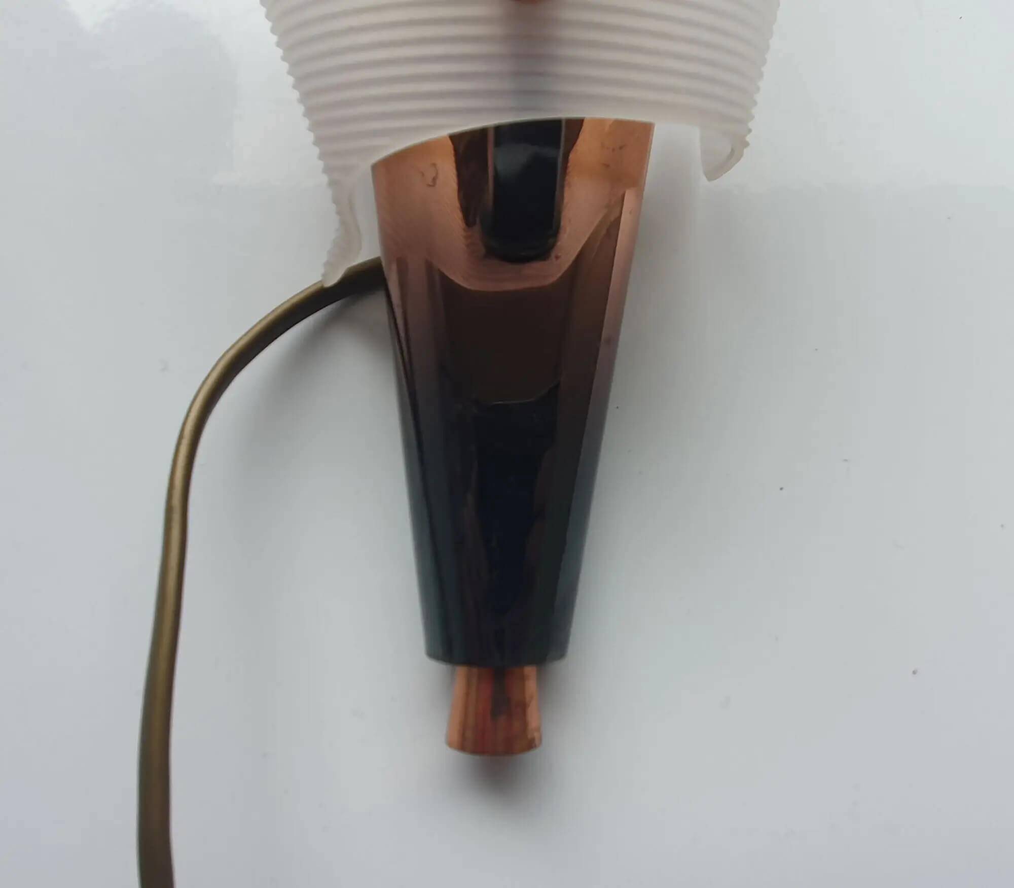 Pair of copper and plexiglass torch wall lights from the 1960s