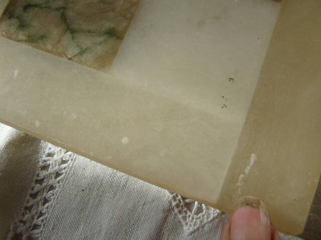 Onyx chessboard and complete wooden chess set.