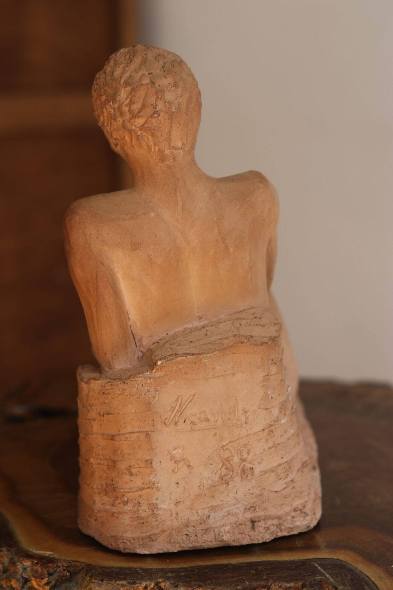 Terracotta young man lying nude, 1988