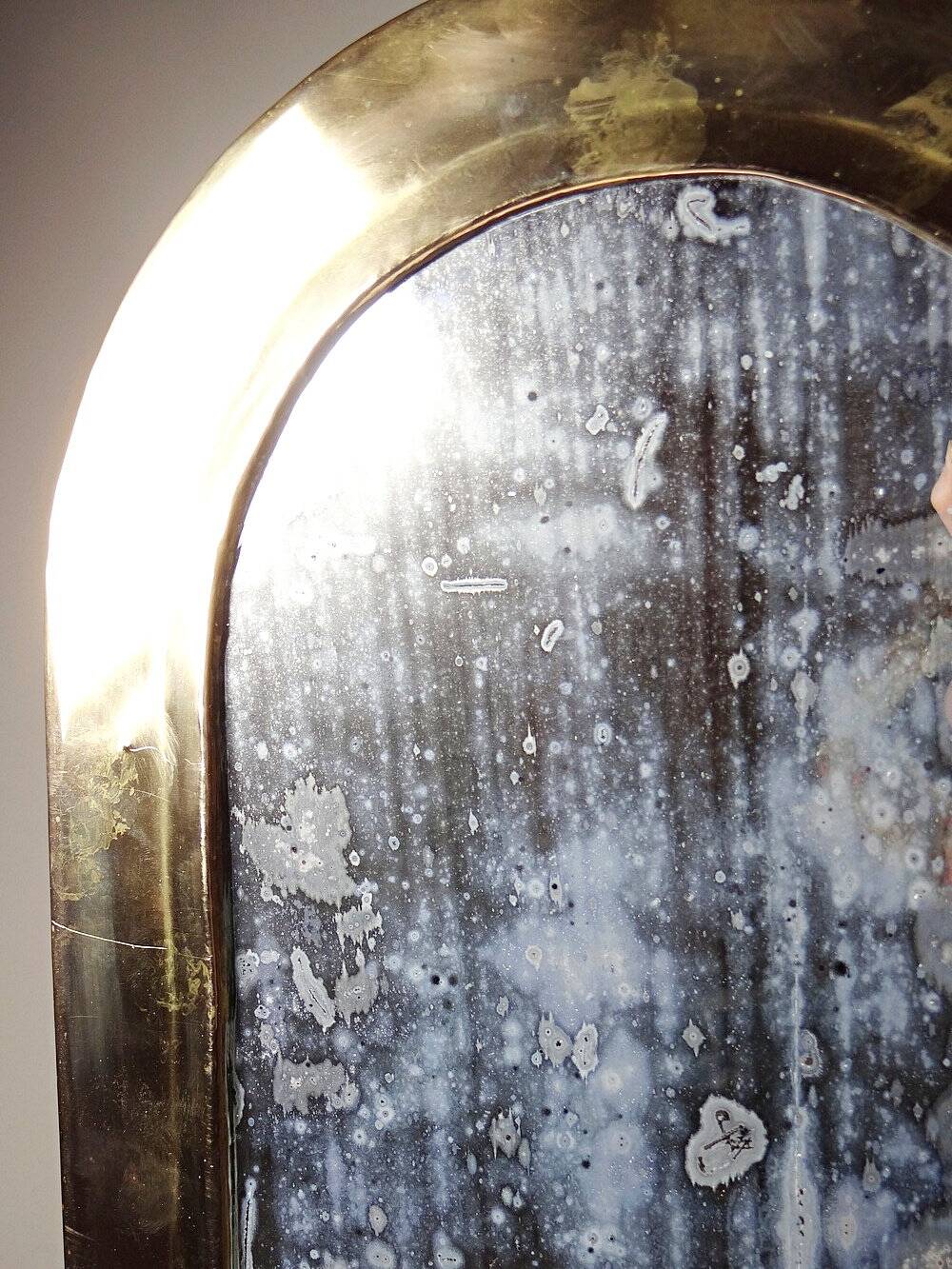 Large vintage Moroccan handcrafted wall mirror from the 1950s-70s, solid brass arch