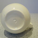 Retro pitcher with naive decorations