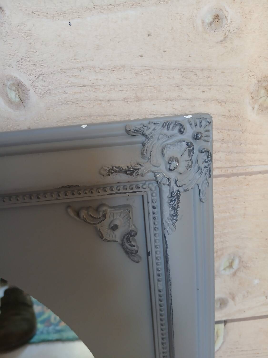 Mirror with a grey wooden frame