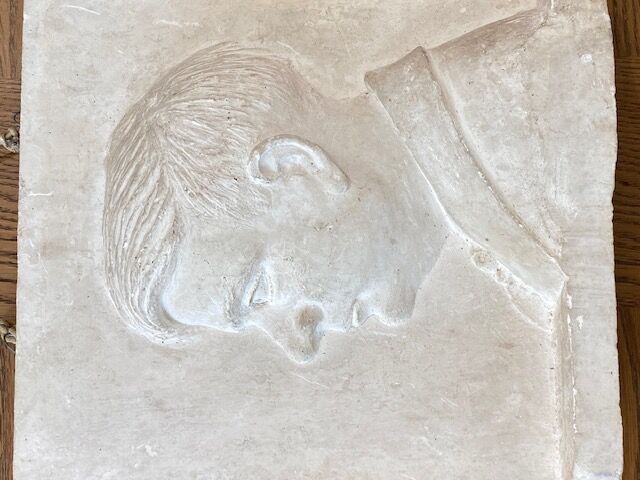 Bust of a man to hang