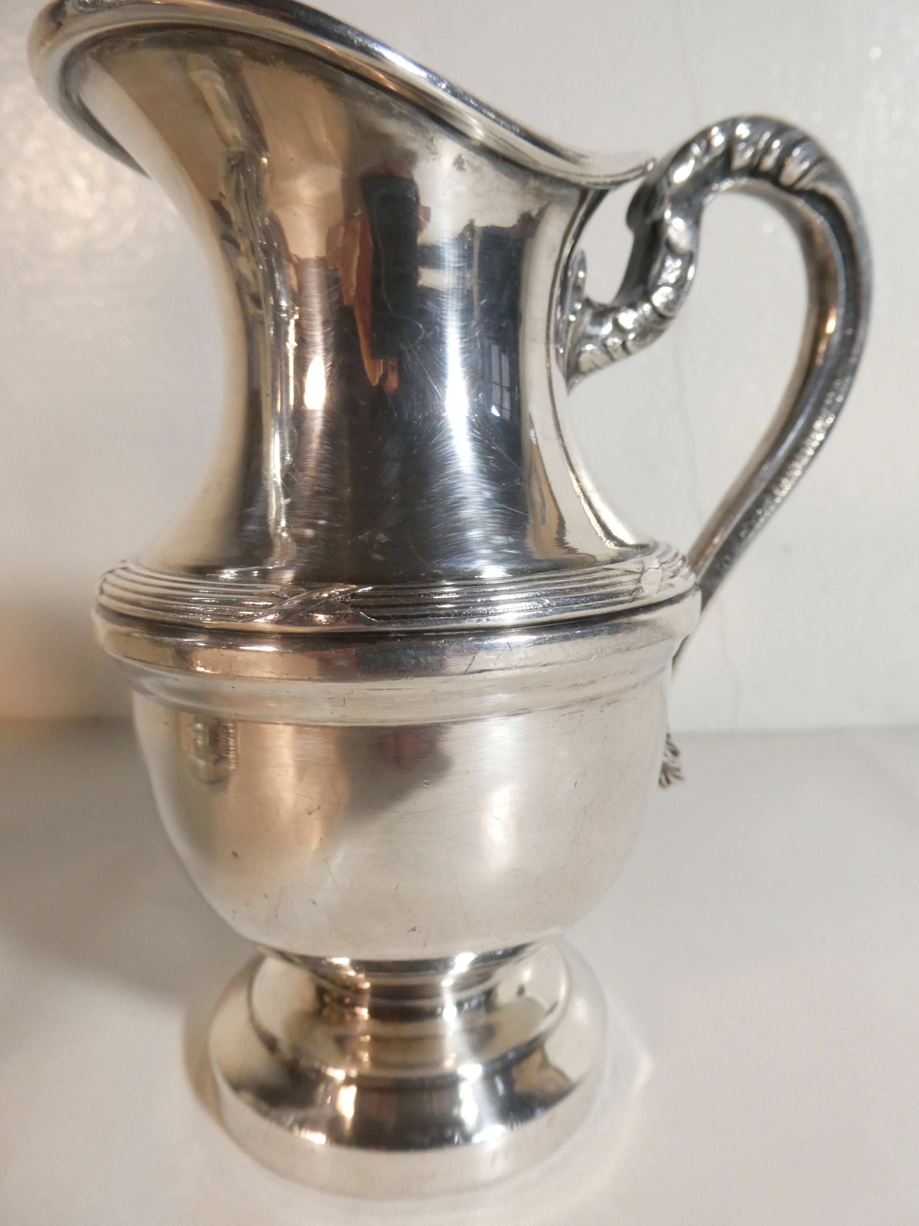 Louis XVI style silver-plated teapot and milk jug