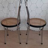 Pair of chrome and cane bistro chairs from the 70s.