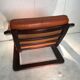 Duo of ochre leather and wood frame armchairs