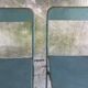 Pair of folding metal chairs, military or industrial, mid-20th century.