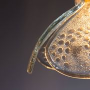 Swedish pendant with glass leaf shades and a center shade of amber coloured