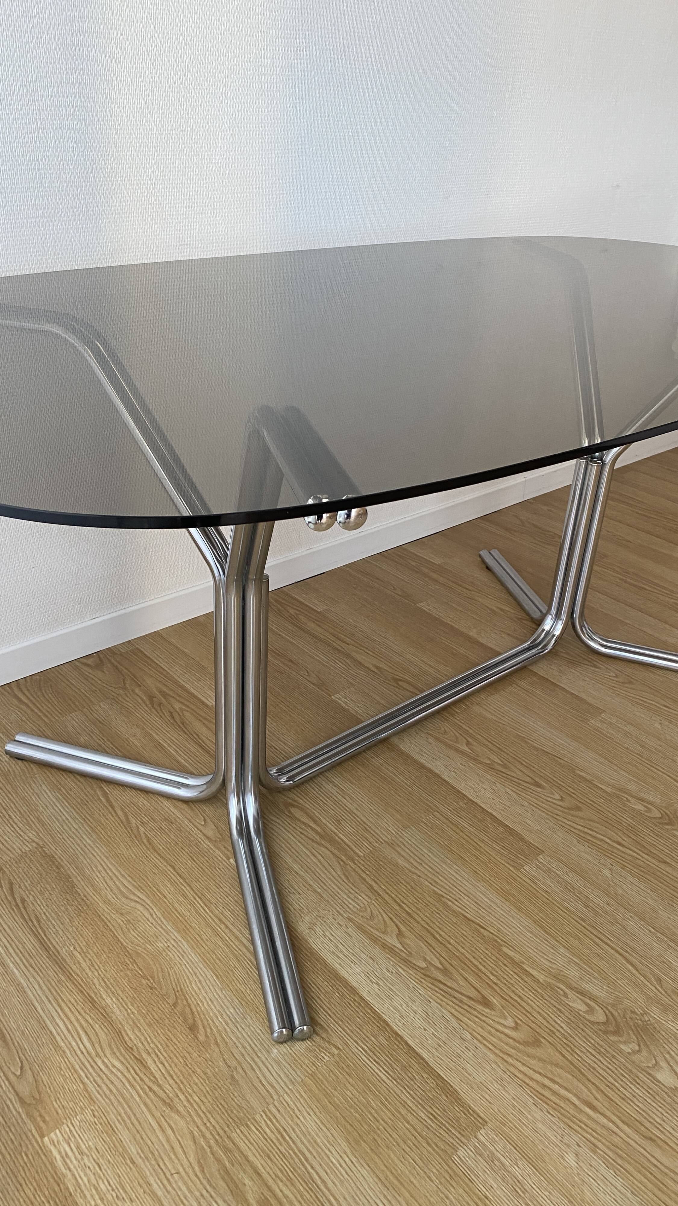 70s oval dining table in glass and chrome