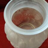 Molded glass vase decorated with fruit