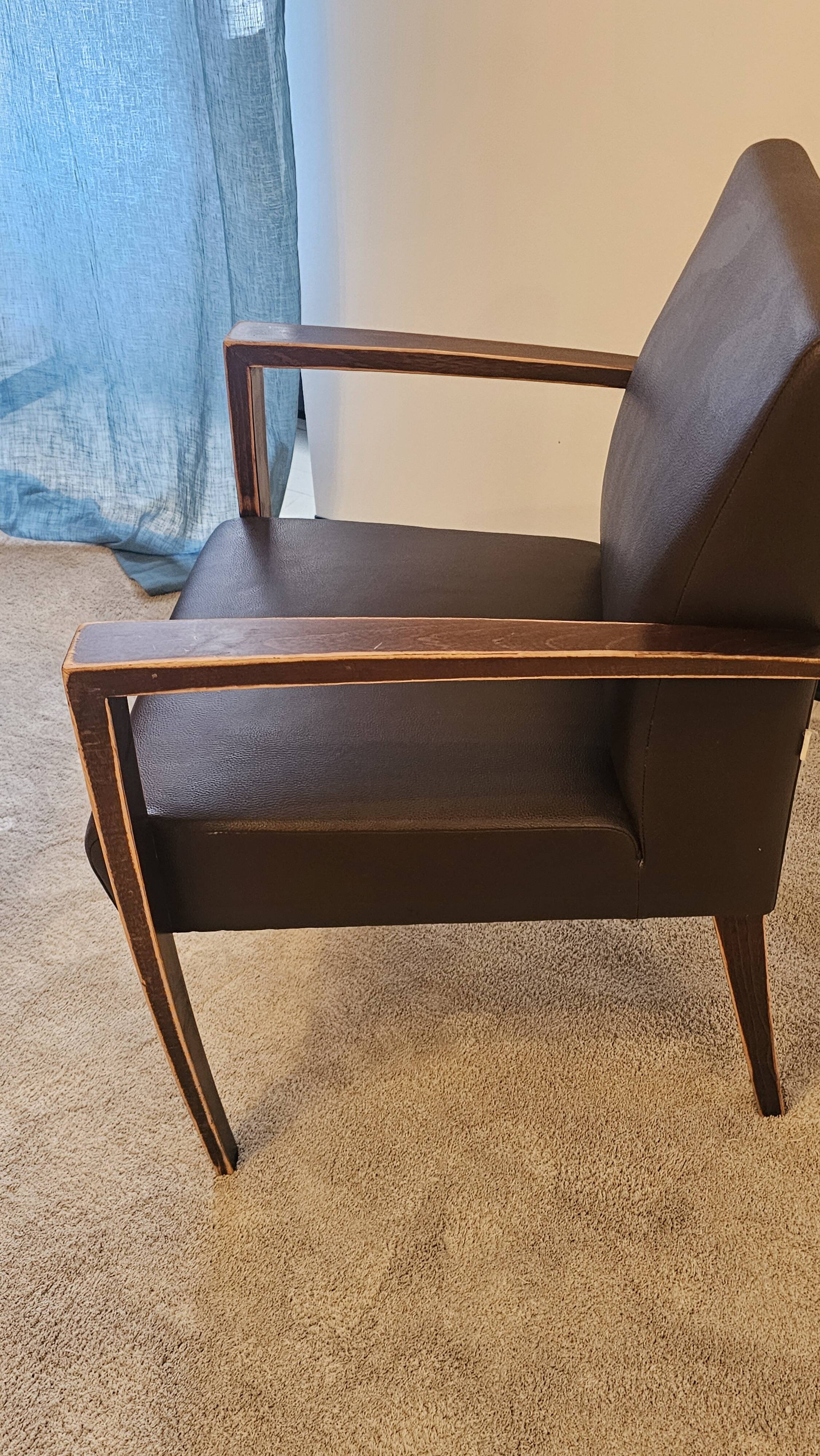 Armchair and faux leather footrest