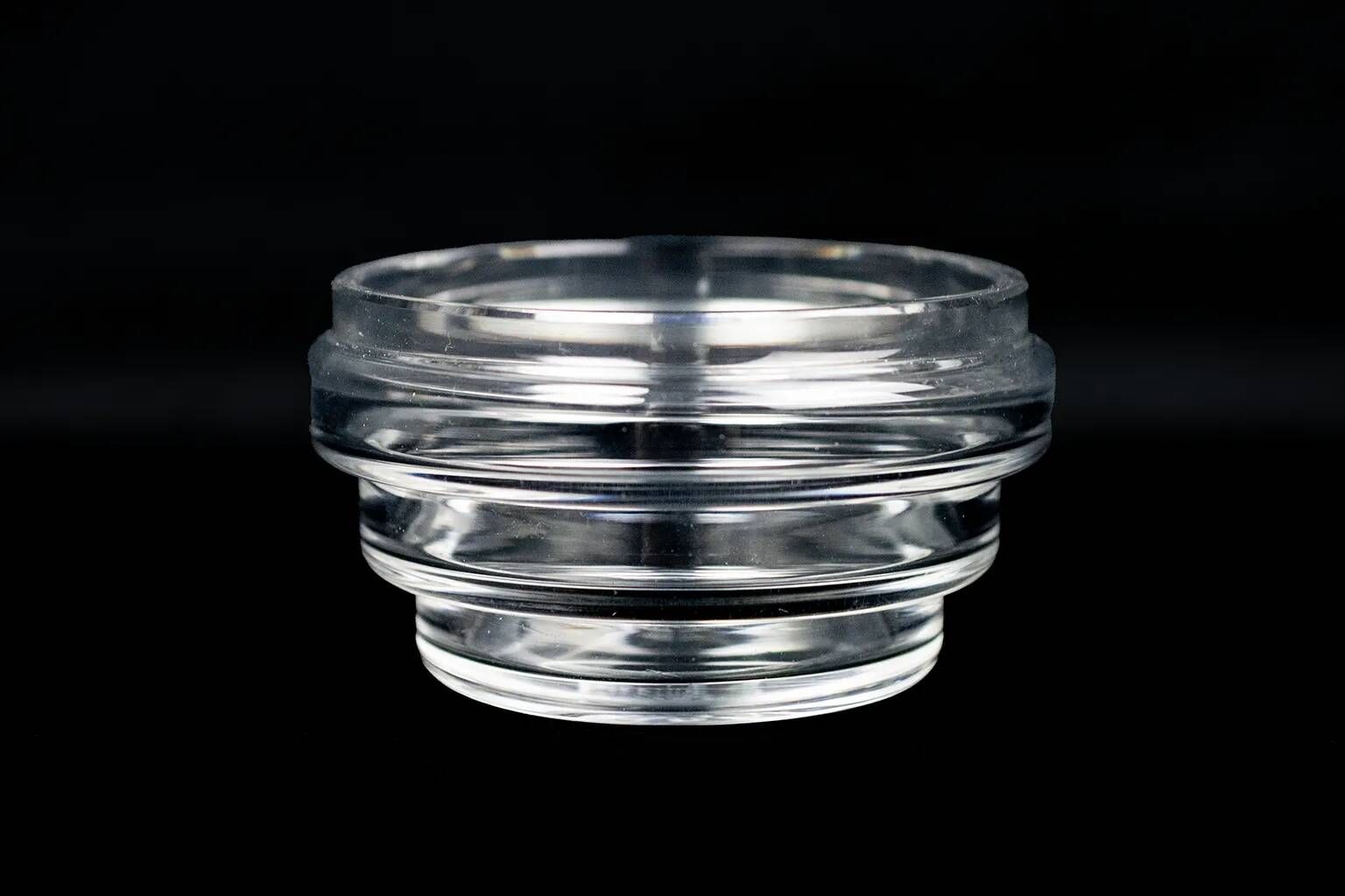 Baccarat crystal dish with wavy profile, acid-etched mark.
