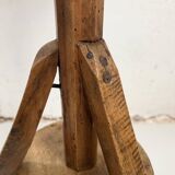Old primitive wooden tripod pedestal table