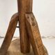 Old primitive wooden tripod pedestal table