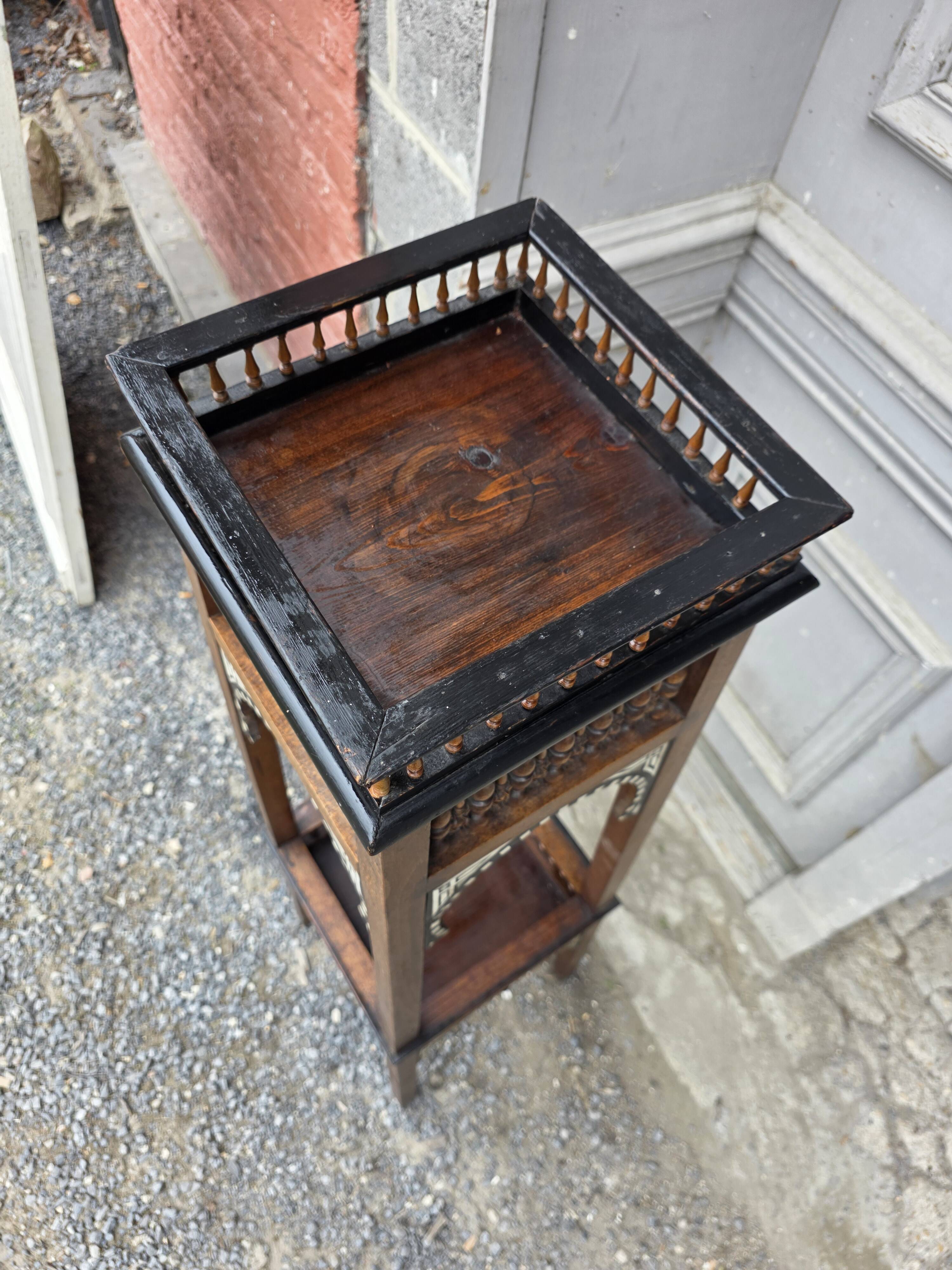 Antique pedestal from the early 20th century.