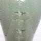 Korean vase in crackled celadon with a pattern of ducks and clouds.