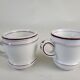 Set of 2 brulot cups in thick porcelain XIXth