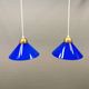 Two lamps in double layered glass with brass top. Danish and estimated from the 1960s