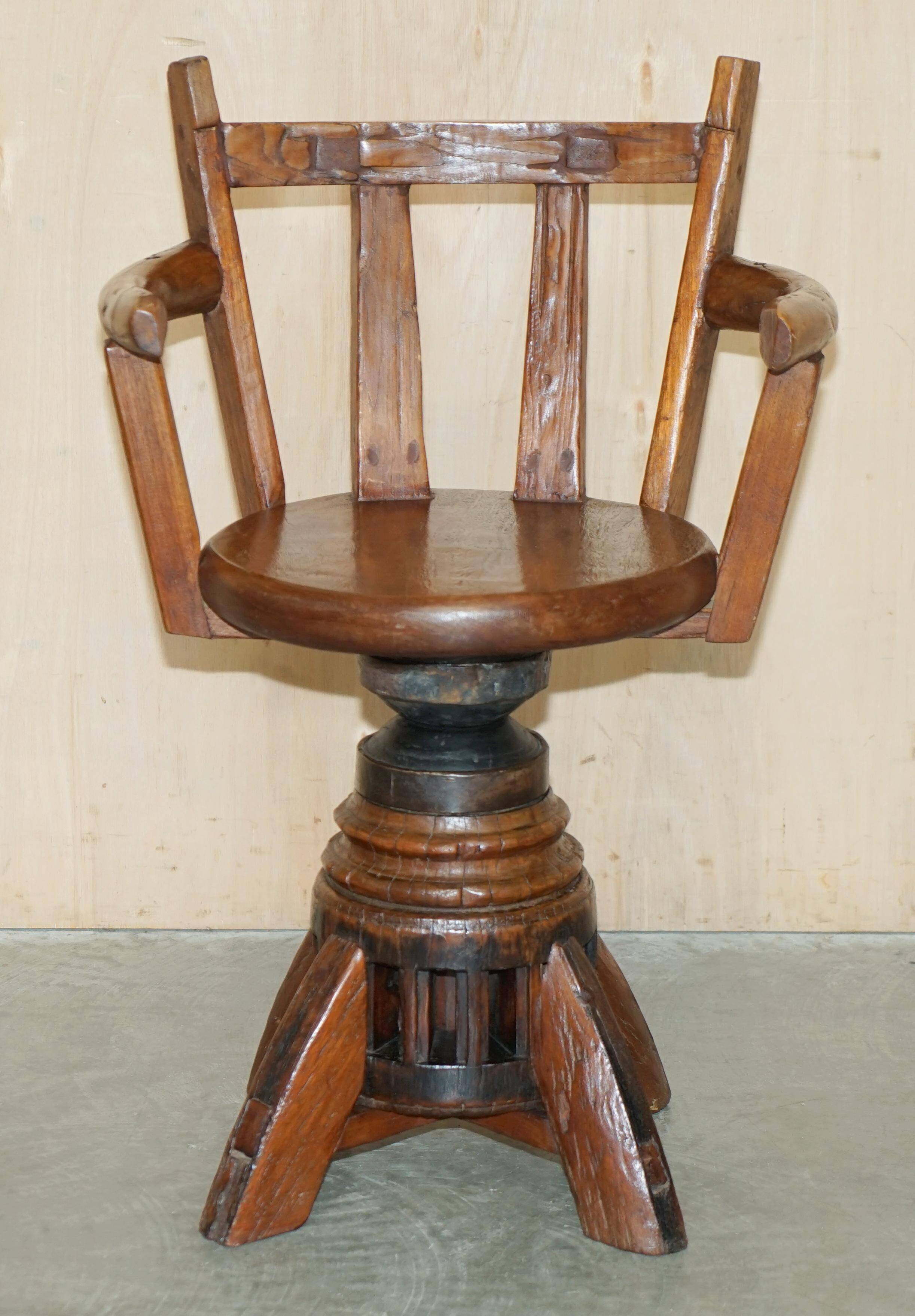 Antique captain's swivel chair on a draft horse wheel from around 1760.