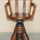 Antique captain's swivel chair on a draft horse wheel from around 1760.
