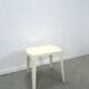Table de jardin en plastique vintage cassé blanc.