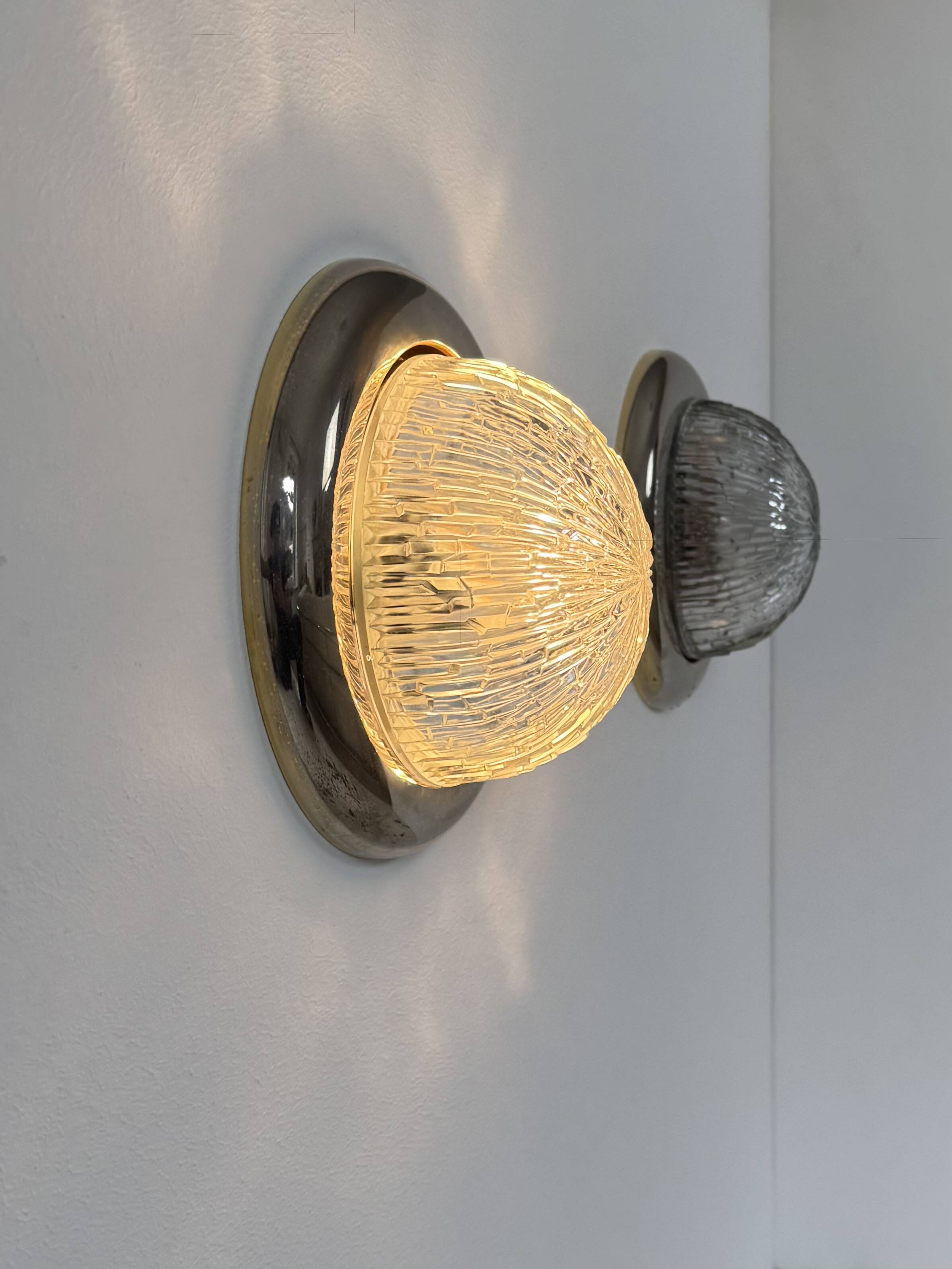 Pair of vintage wall lights, brass and pressed moulded glass, France, 1960.