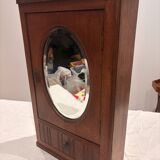 Wall cabinet with oval wall and drawer