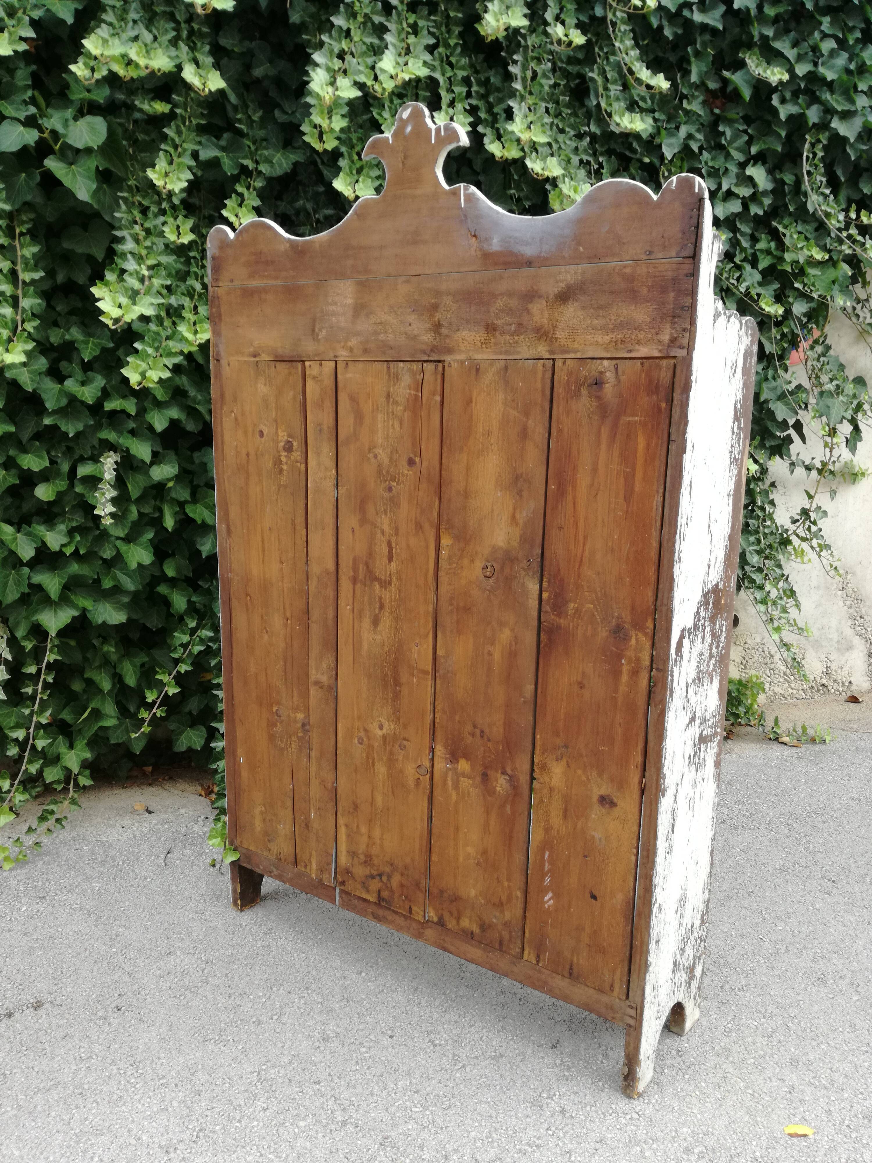 Old white shelf in weathered pine