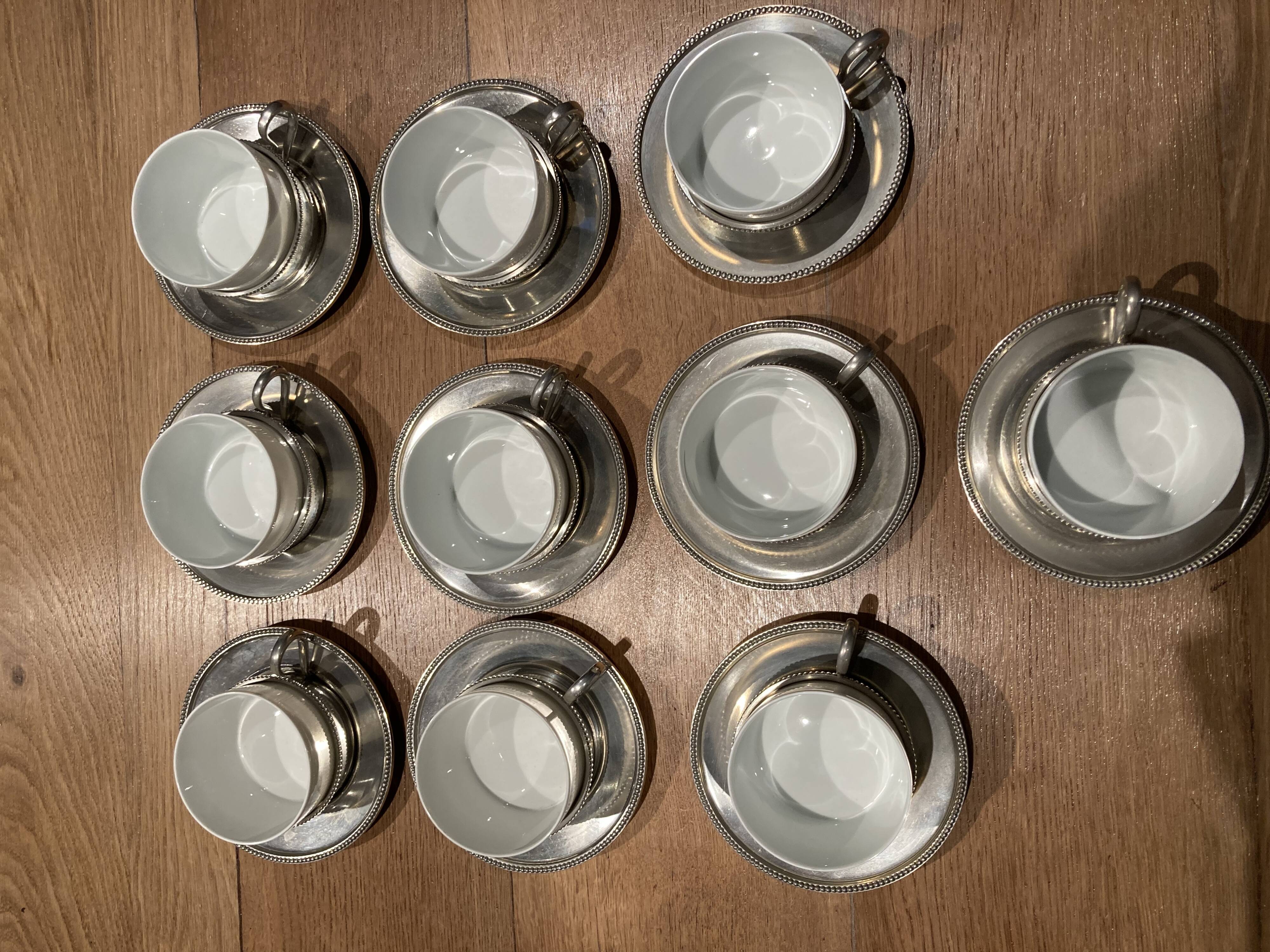 10 cups limoges and under cups in brushed tin