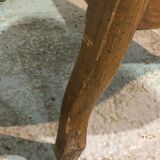 Old Voltaire armchair in light brown leather