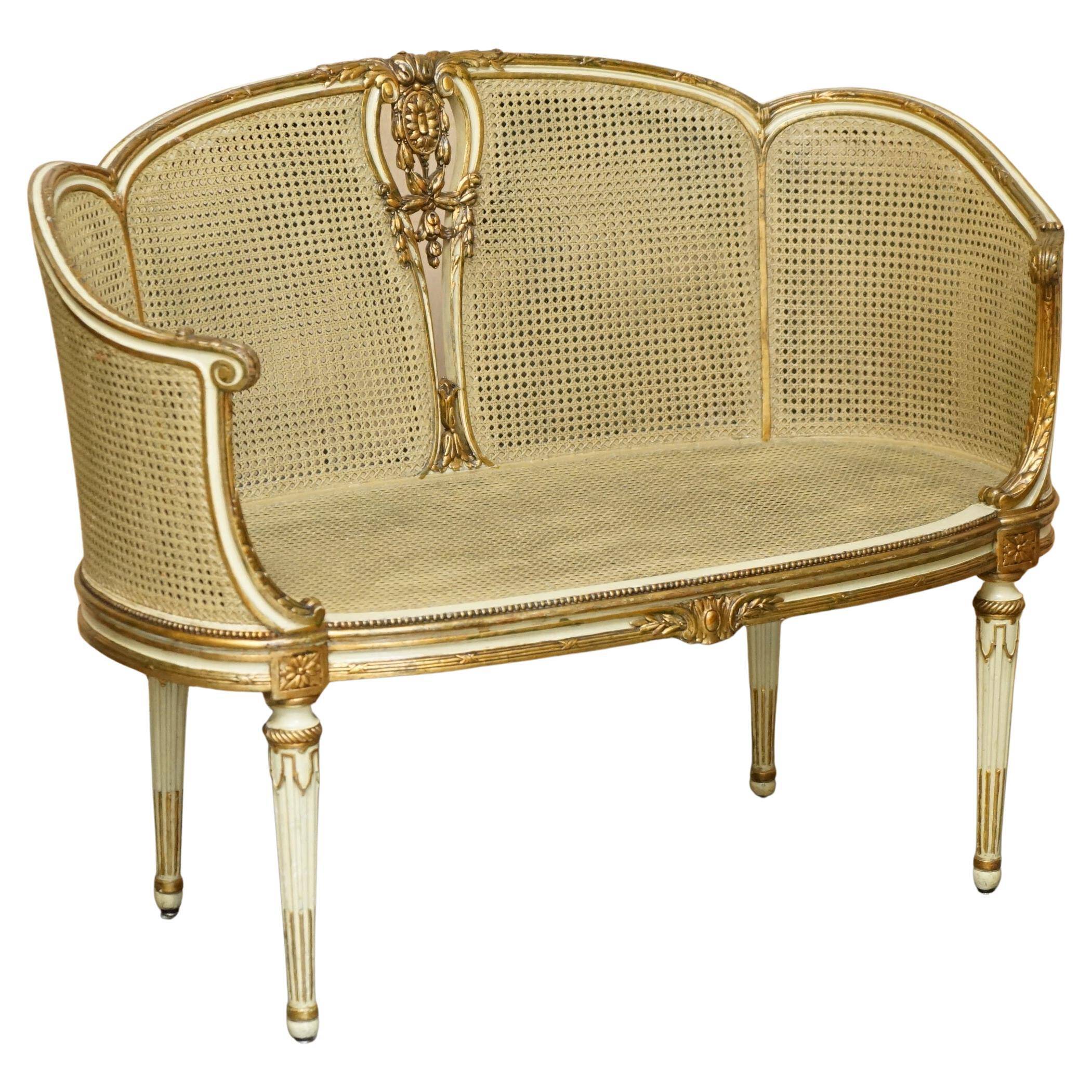 Louis XVI Bergère canapé in gilded wood with double caning