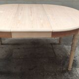 Round table with two raw cherry wood extensions