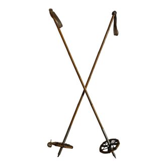 Pair of old leather and reed ski poles