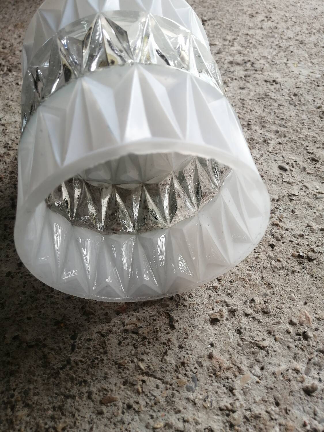 Vintage globe pendant light in molded glass.