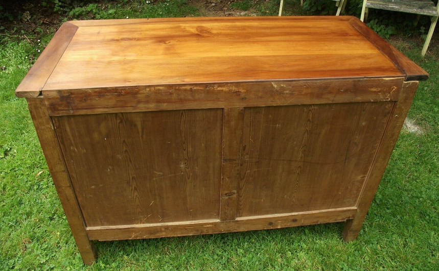 Old chest of drawers in walnut period restoration