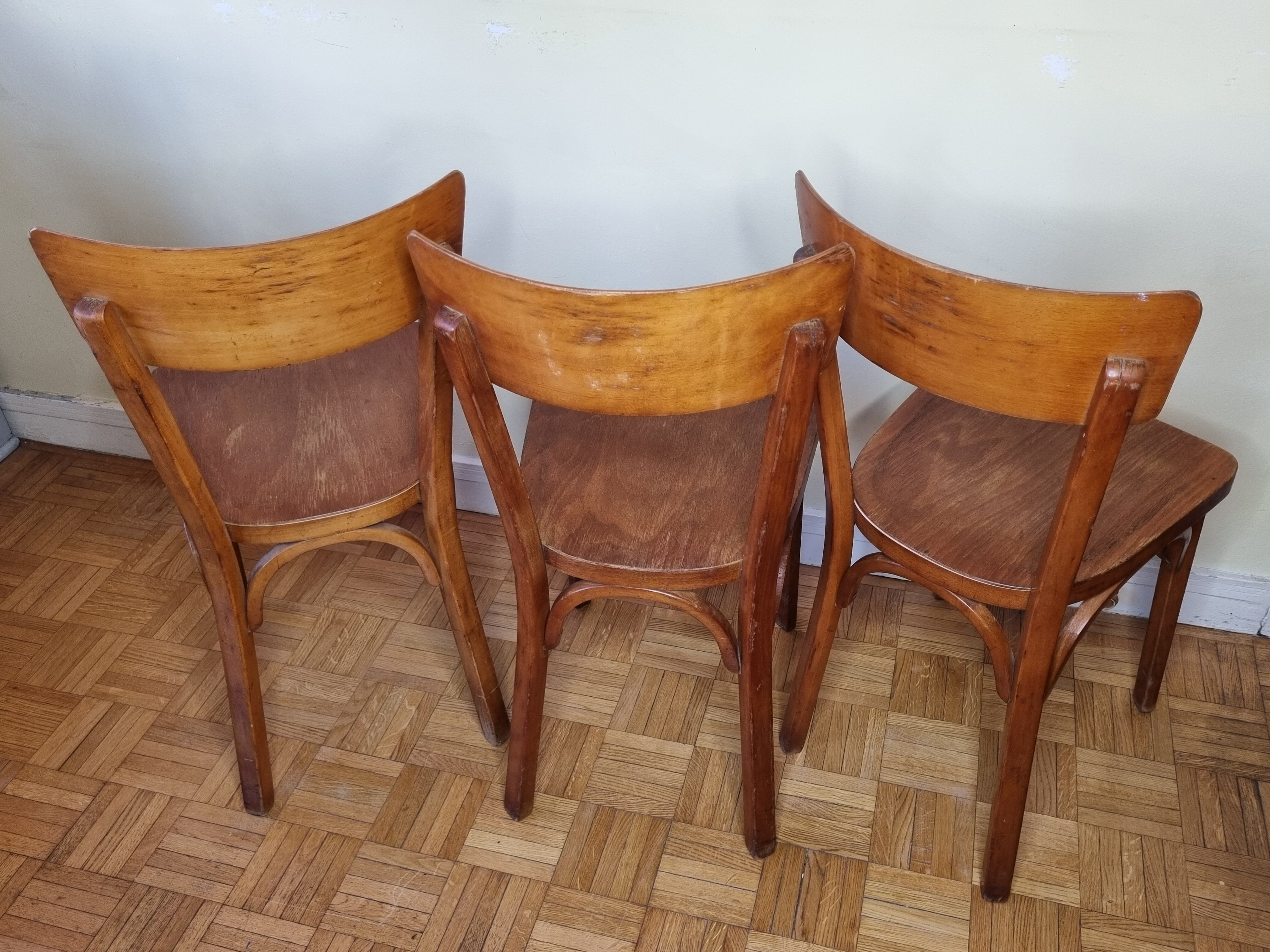 Ensemble de trois chaises bistrot Baumann