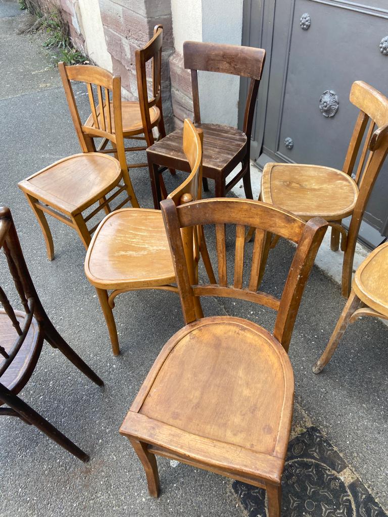 Set of 10 mismatched curved wood bistro chairs from the 1950s-60s