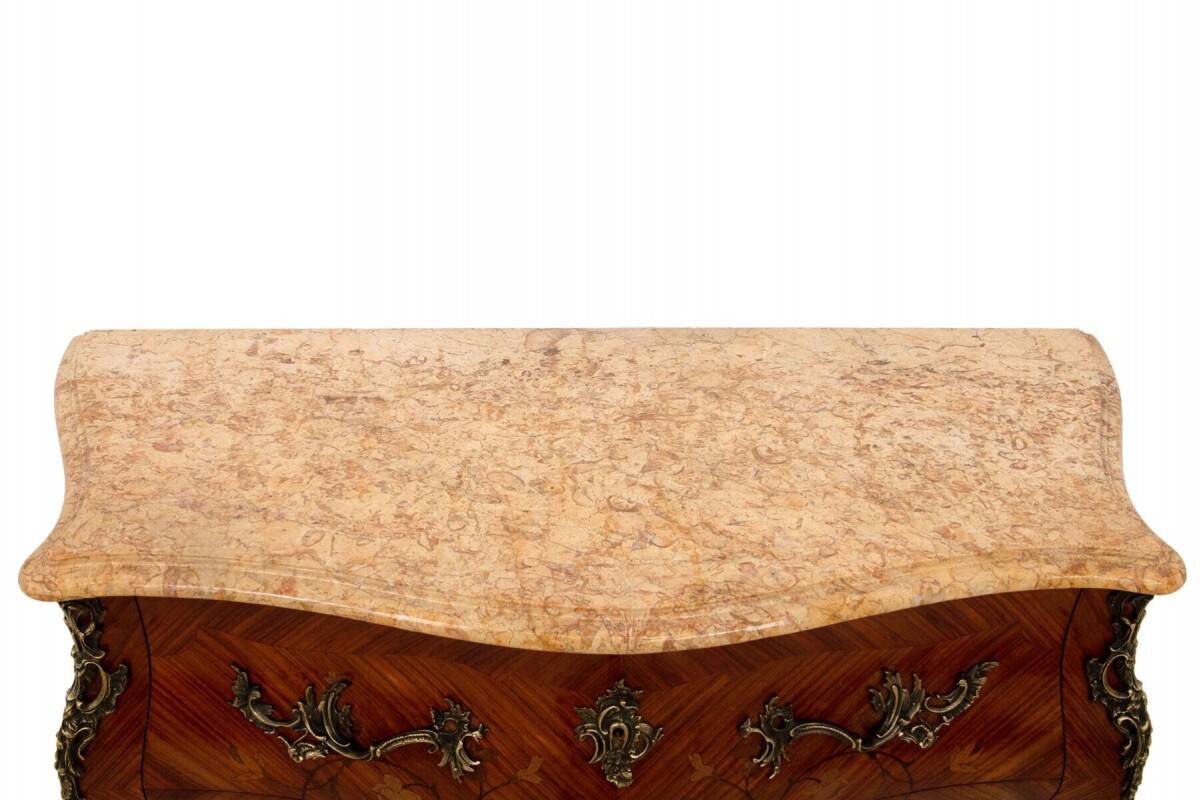 Inlaid chest of drawers with a marble top in the Louis XV style, France