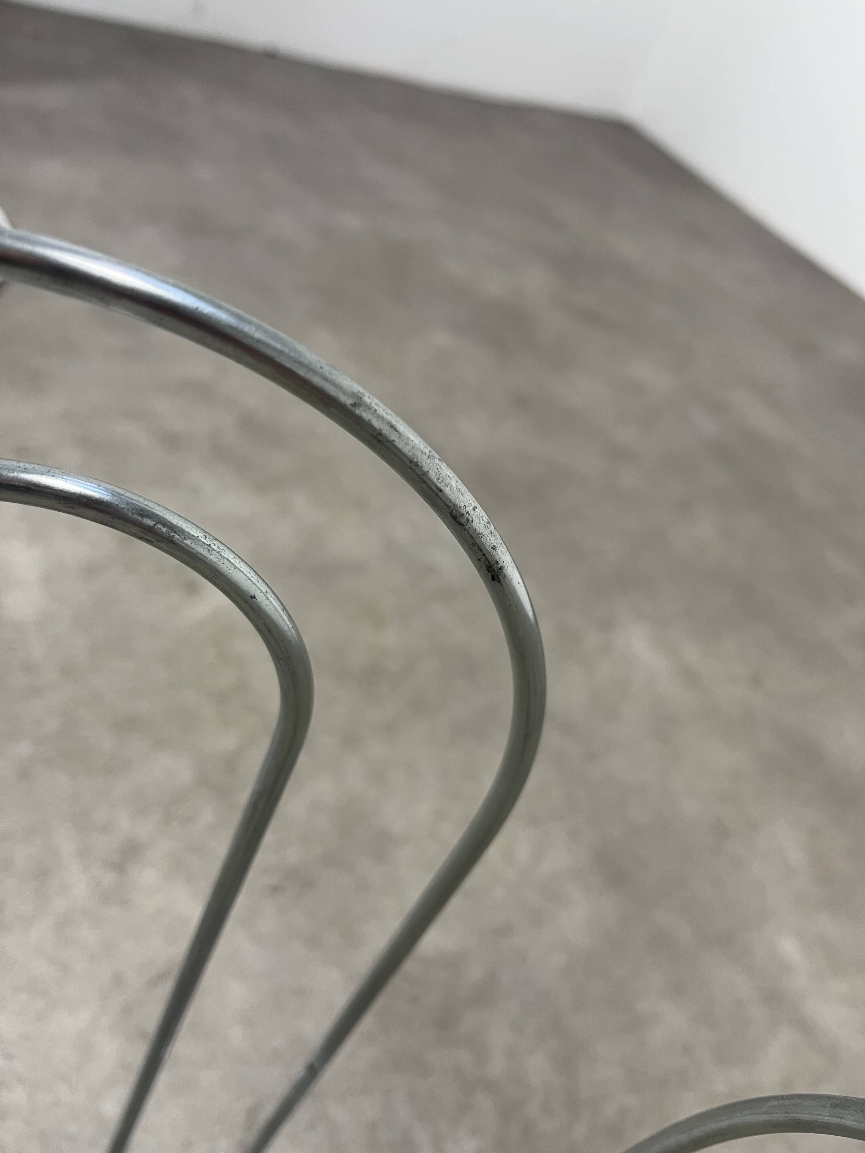 Postmodern chrome metal magazine rack from the 80s